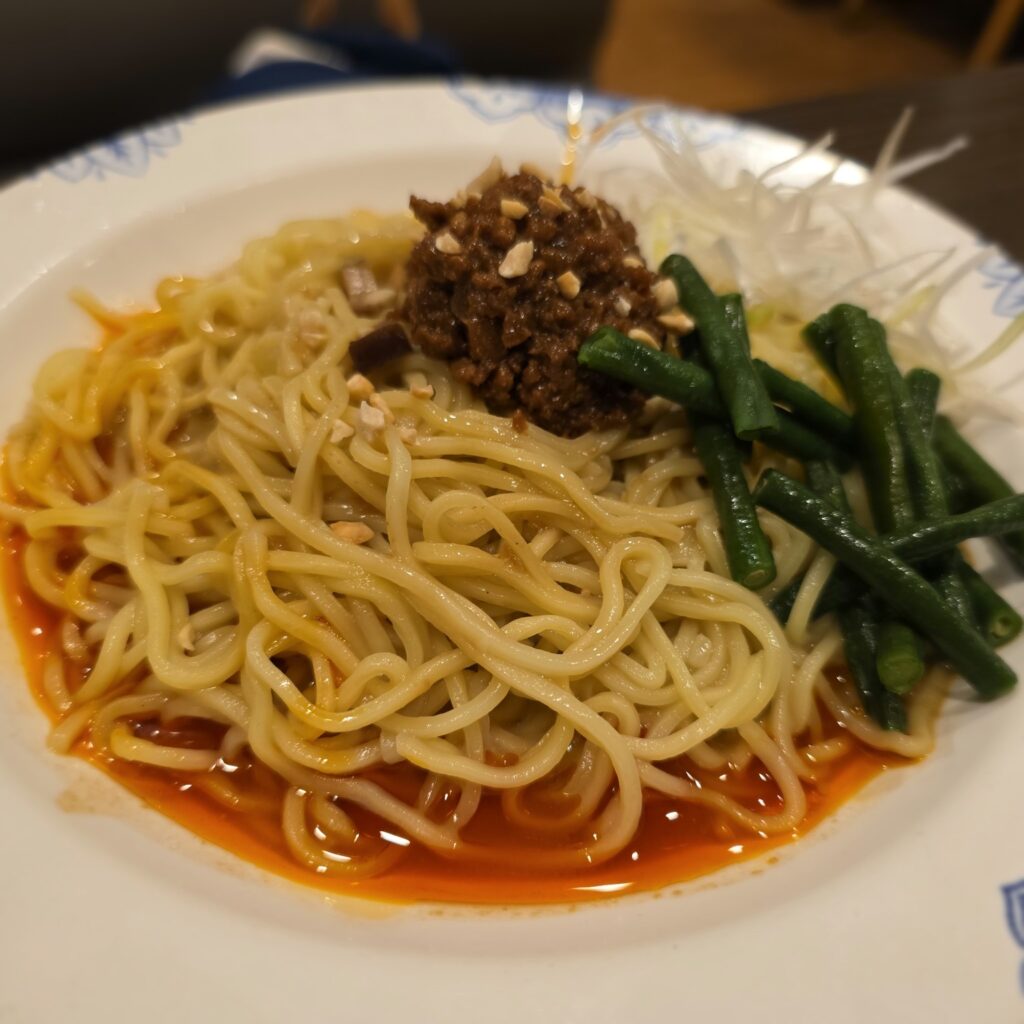 Chilled dan dan noodles with minced meat and green vegetables at Bamiyan in Japan