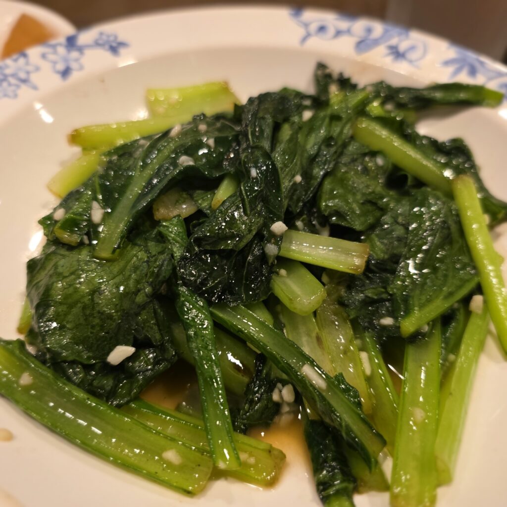 Stir-fried Chinese greens served at Bamiyan in Japan