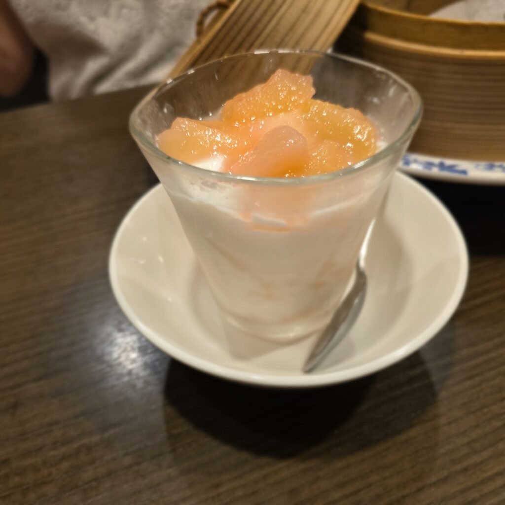 White peach dessert in a glass served at Bamiyan in Japan